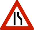 Road narrows On right side.