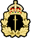 Beret cap badge of the BAUSOFCOM