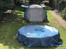 Overview of Plitvice: a swimming pool, tent and trampoline, July 2020
