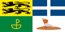 A flag divided into four quarters featuring the banner of arms of the Grand Duchy of Flandrensis in the first quarter, the Flag of the Empire of Imvrassia in the second quarter, the Flag of Urabba Parks in the third quarter and the badge of the County on a white background in the fourth quarter
