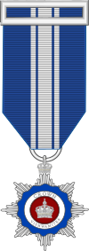 Heraldic insignia of the Member grade.