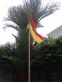 Flag of Indokistan raised on a flagpole in Suwarnakarta