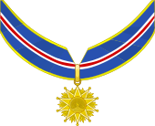 Heraldic insignia of the Commander 1st Class grade.