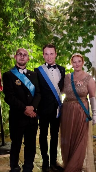 File:HSH Prince Vincent of Hélianthis pictured with HRH Crown Prince John of Lithua, and HRH Princess Clare of Lithua.jpg