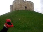 Looking up at Clifford's Tower.